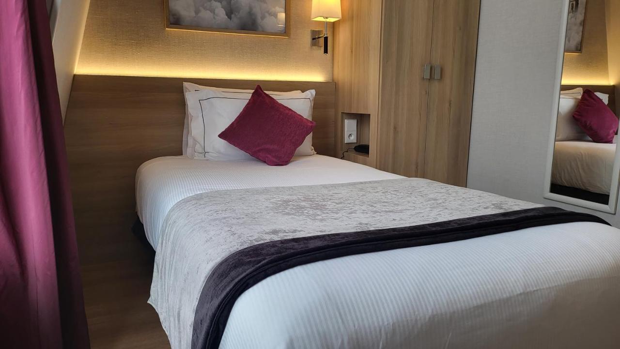 Hotel Magda Champs Elysées Parigi